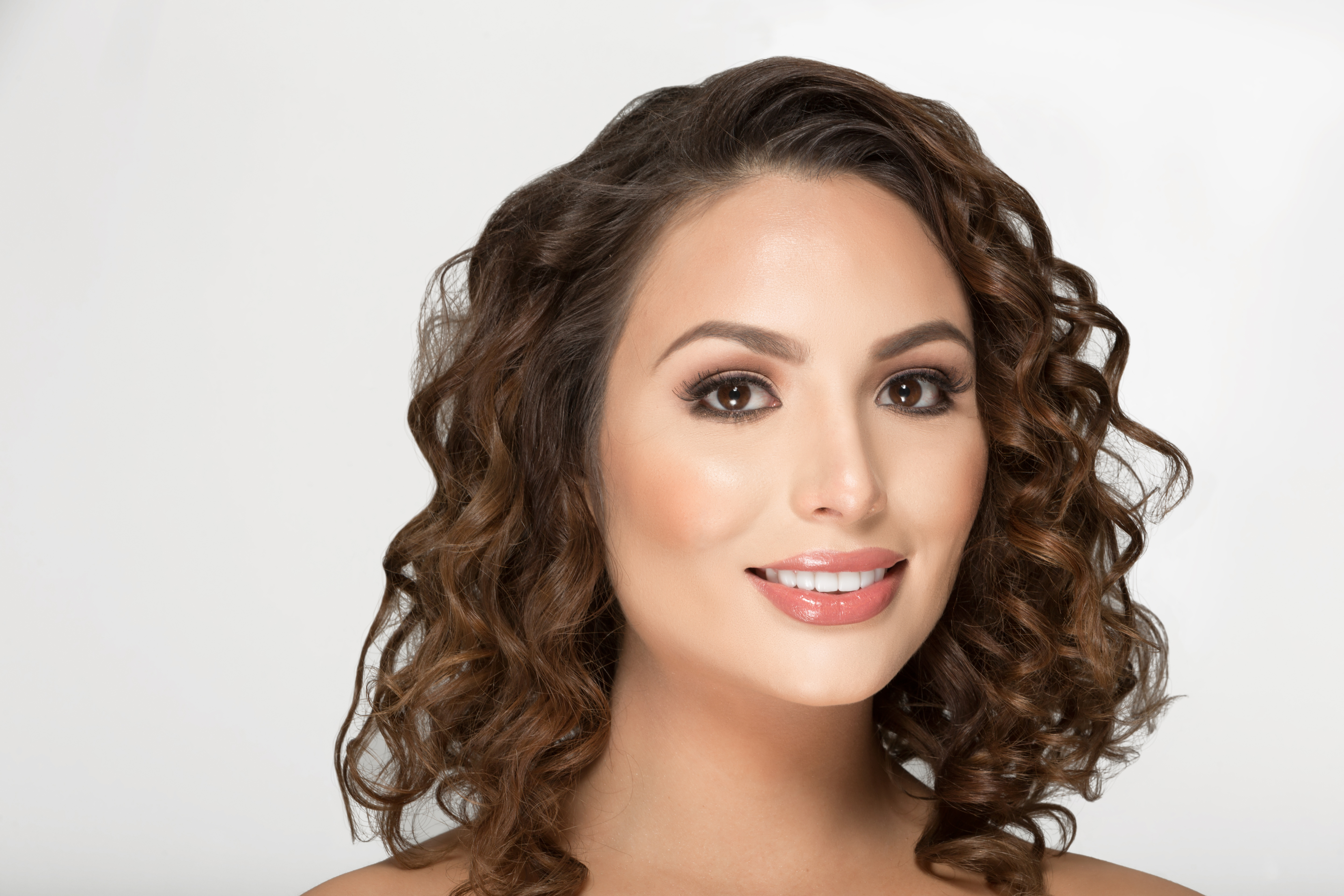 Woman with curly brown hair